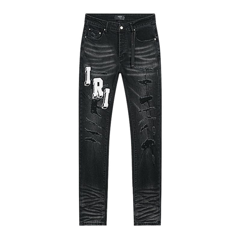AMIRI Varsity Letter Appliqué Distressed Jeans — front